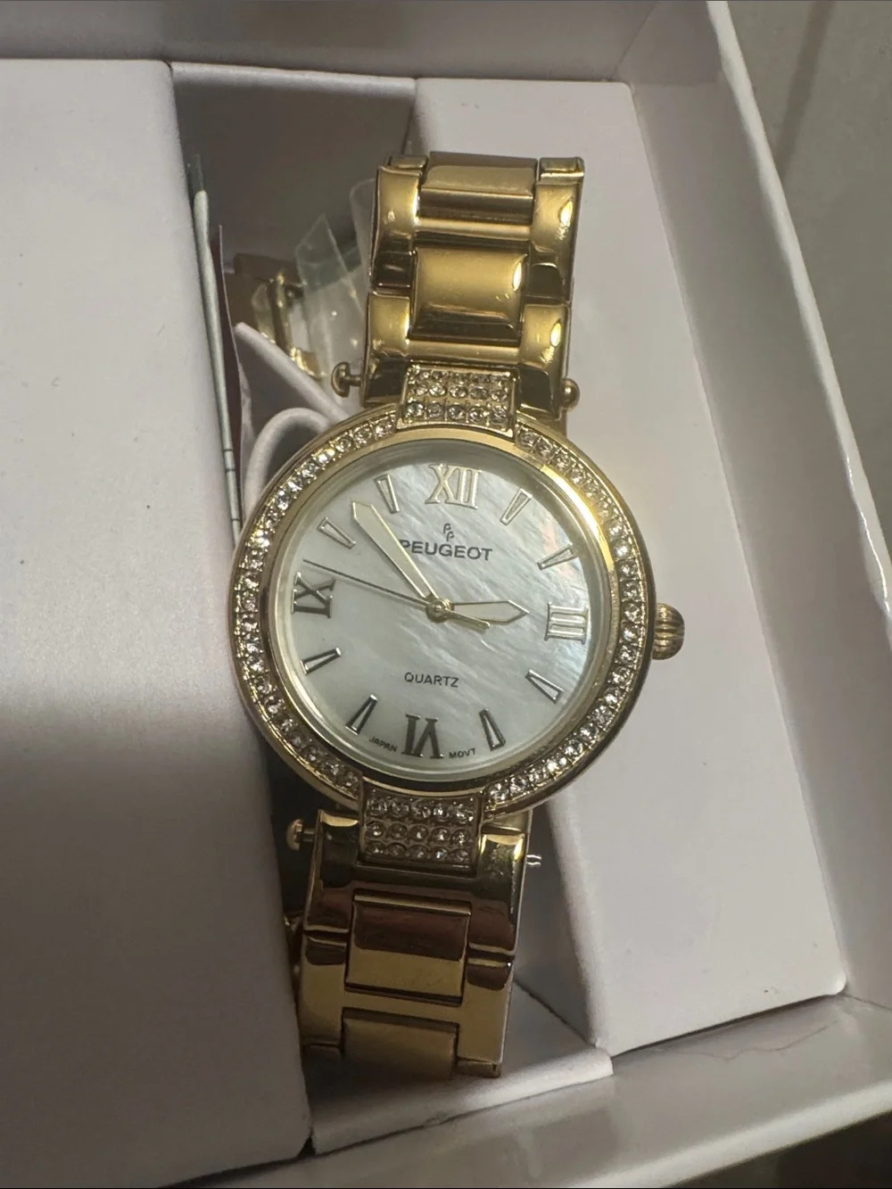Peugeot Gold-Tone Crystal Bezel Women’s Watch with White Dial brand new with box